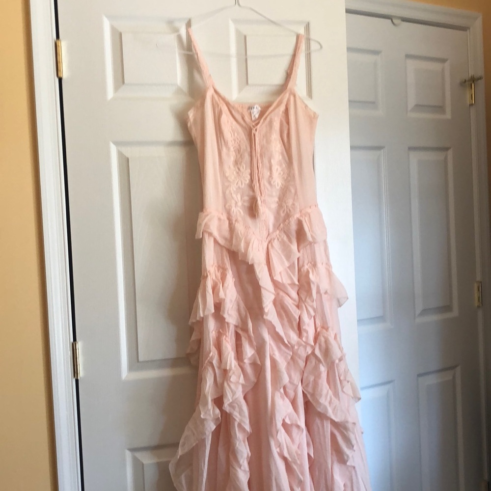 Maxi dress, with soft feminine ruffles.